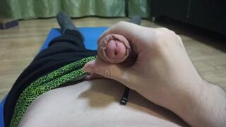 The boy masturbates off his cock