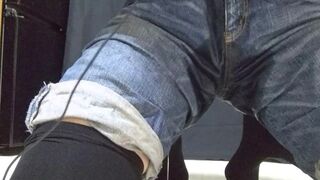 A man's daughter-in-law dressed in denim leaked urinate while toying with an electrical vibro.