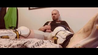 Jerk in Hockey shinpads Soccer cleats and Hockey mittens